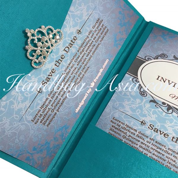 luxury wedding envelope with crown brooch