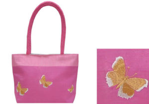 Embroidered silk handbag in pink with butterfly embroidery