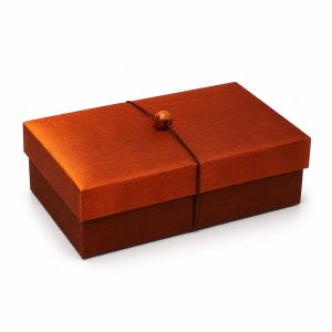 Thai silk box with wooden button decoration