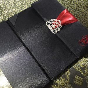 Black and red monogram embroidered silk gatefold invitation