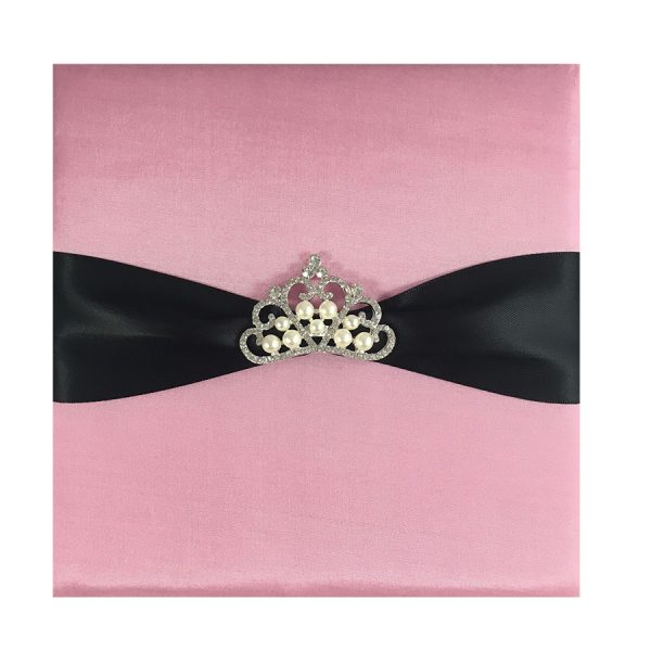 Pink silk card with pearl brooch