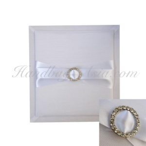 white silk pad with buckle for invitations