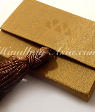 golden silk name-card holder with brown tassel