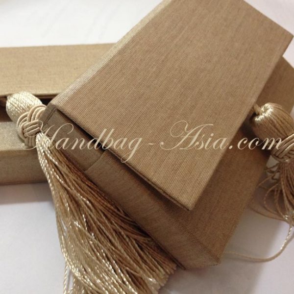 silk name-card holder with tassel embellishment and magnet lock