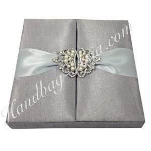 Silver wedding box with crown pearl brooches