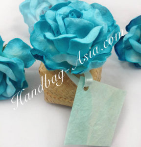 bamboo favor box with paper flower and card