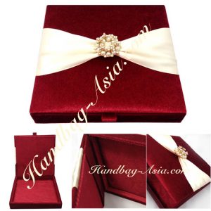Luxury red velvet box with pearl brooch for invitation cards