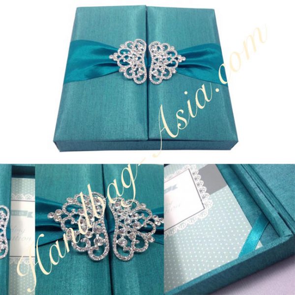 teal wedding invitation box with crystal crown pair brooch