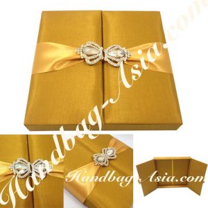 Impressive Silk Box Covered With Golden Faux silk, Embellished With Gold Plated Rhinestone Crown Brooches