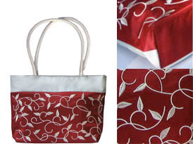 Embroidered silk handbag with silk shoulder handles