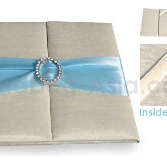 Embellished invitation with buckle