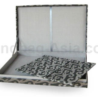 Padded invitation box in silver with hinged lid and printed design