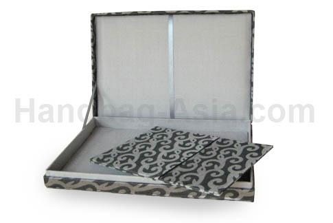 Padded invitation box in silver with hinged lid and printed design