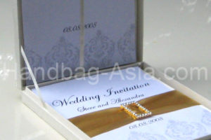 high end couture wedding invitation in a box