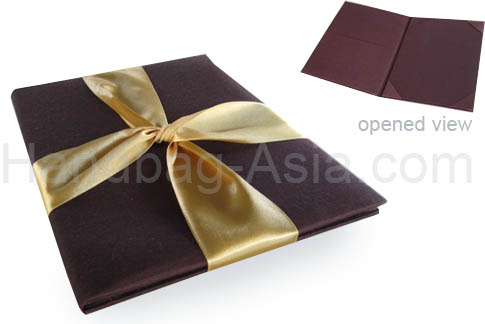 Embellished brown silk folder with golden ribbon
