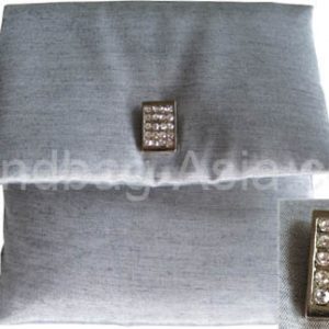 Silver silk envelope with padding and crystal button