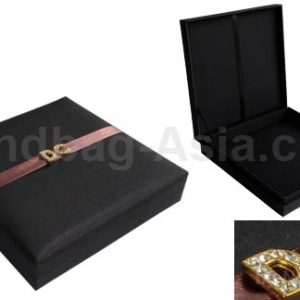 Embellished black silk box with hinged lid
