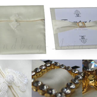 Embellished silk envelope with pad and buckle