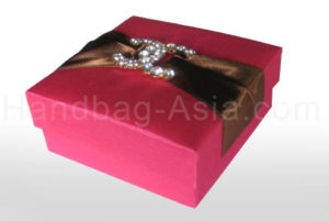 Luxury fuchsia pink silk gift box for wedding favor and gift packaging featuring rhinestone brooch