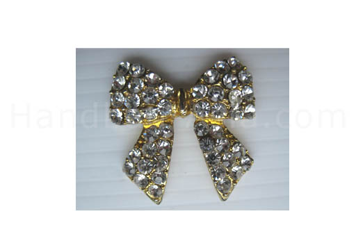Crystal bow in gold