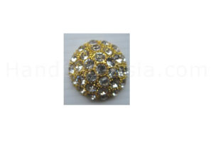 rhinestone button in gold with clear stones