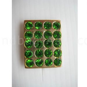 crystal button with green rhinestones