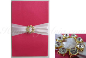 Embellished silk covered card holder with golden rhinestone buckle