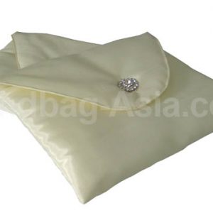 ivory silk envelope with round flap and crystal button
