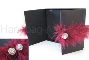 black wedding box covered with silk, embellished with feather embellishment