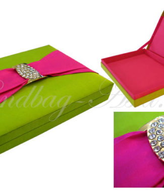 green and fuchsia pink wedding box that is embellished