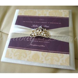 Embellished silk card with pearl crown brooch