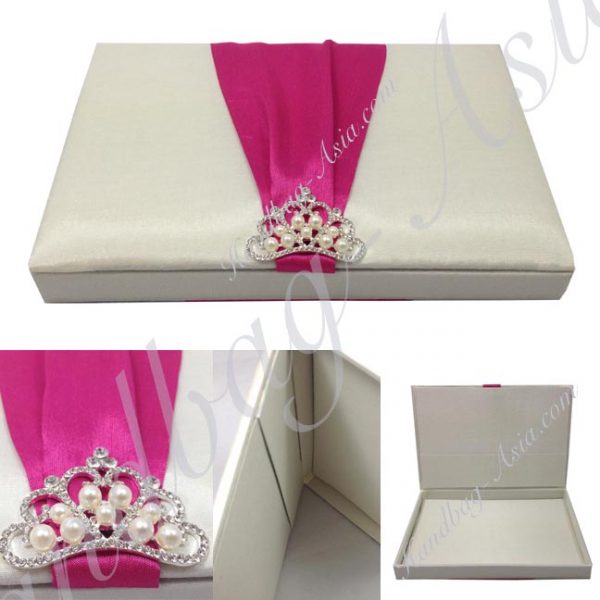 ivory wedding box with fuchsia ribbon and pearl crown brooch