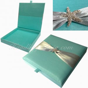 beach theme boxed wedding invitation with starfish rhinestone brooch
