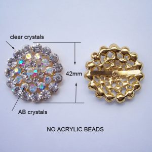 large golden round crystal brooch with ab stones