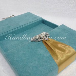 velvet wedding box with pearl crown brooch embellishment