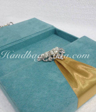 velvet wedding box with pearl crown brooch embellishment