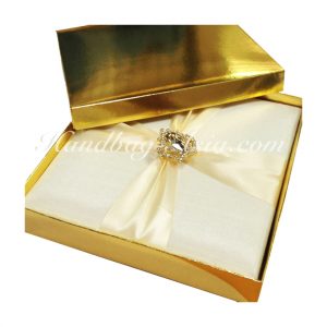 Metallic gold mailing box for wedding invitations