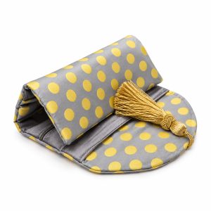 Polka dot cotton jewelry roll with silk lining and decorative tassel