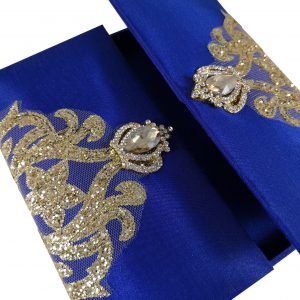 Royal blue boxed invitation with embellishment