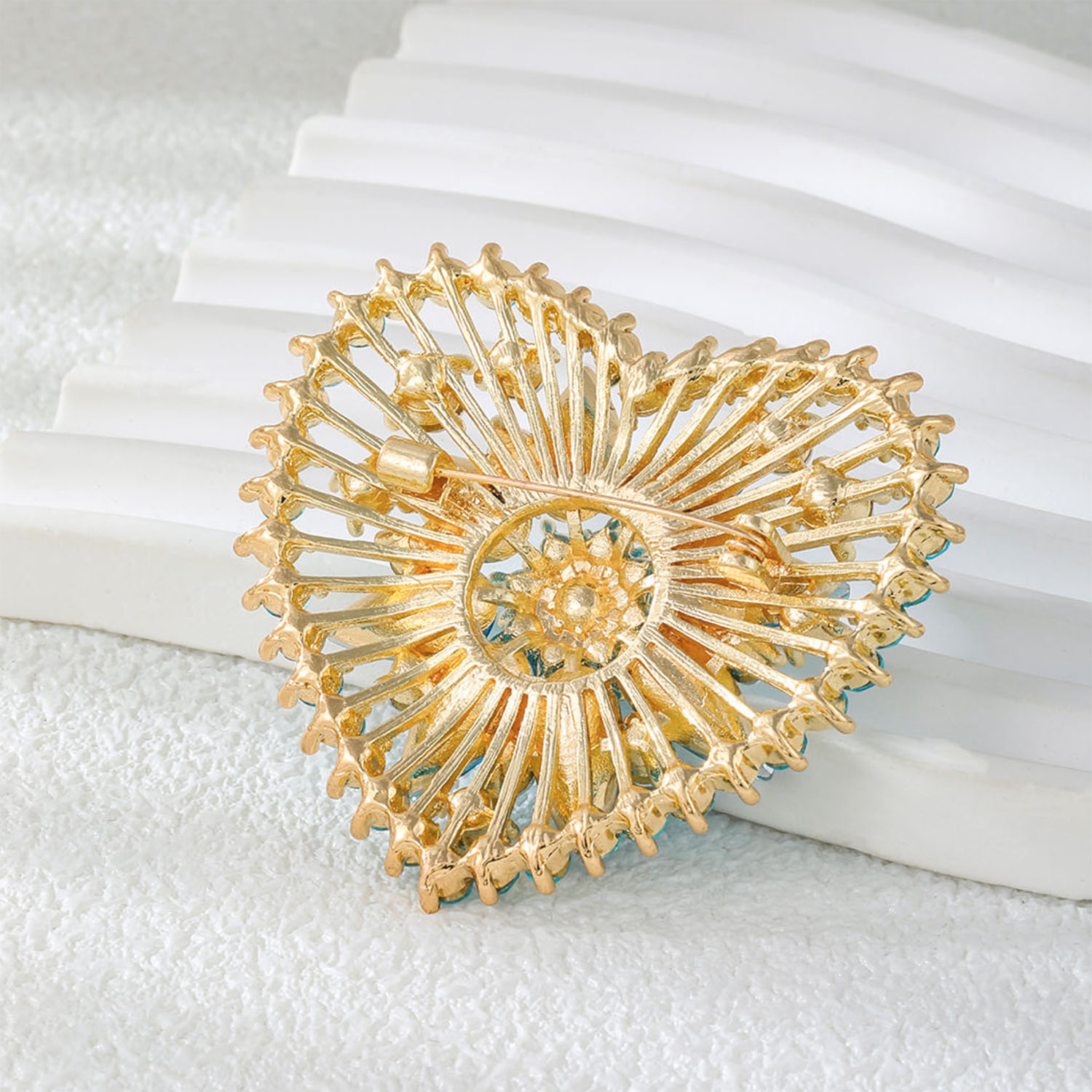 backside of heart shaped rhinestone brooch