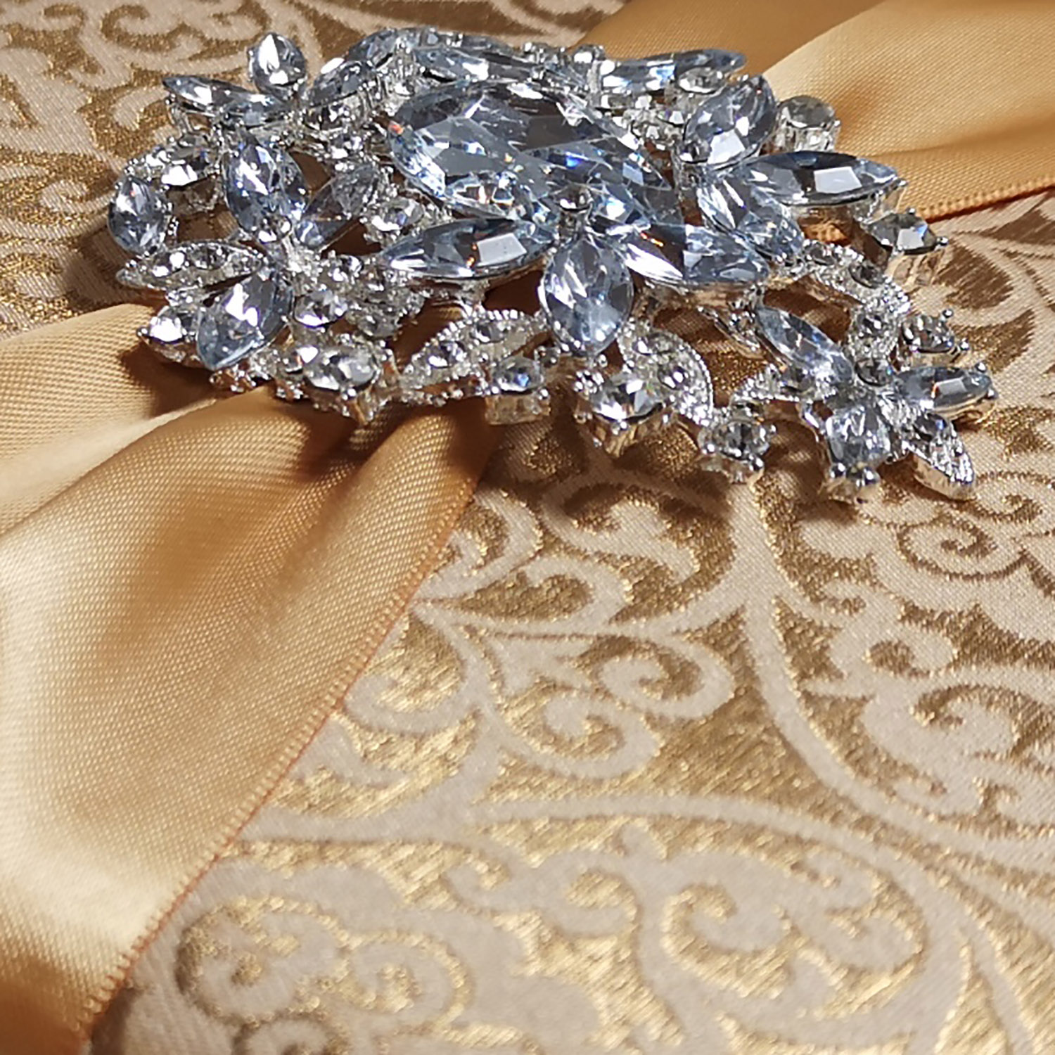 Close-up picture of our elegant rhinestone brooch embellishment