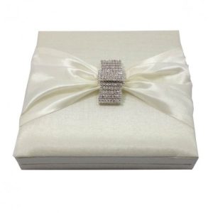 embellished ivory invitation box with brooch