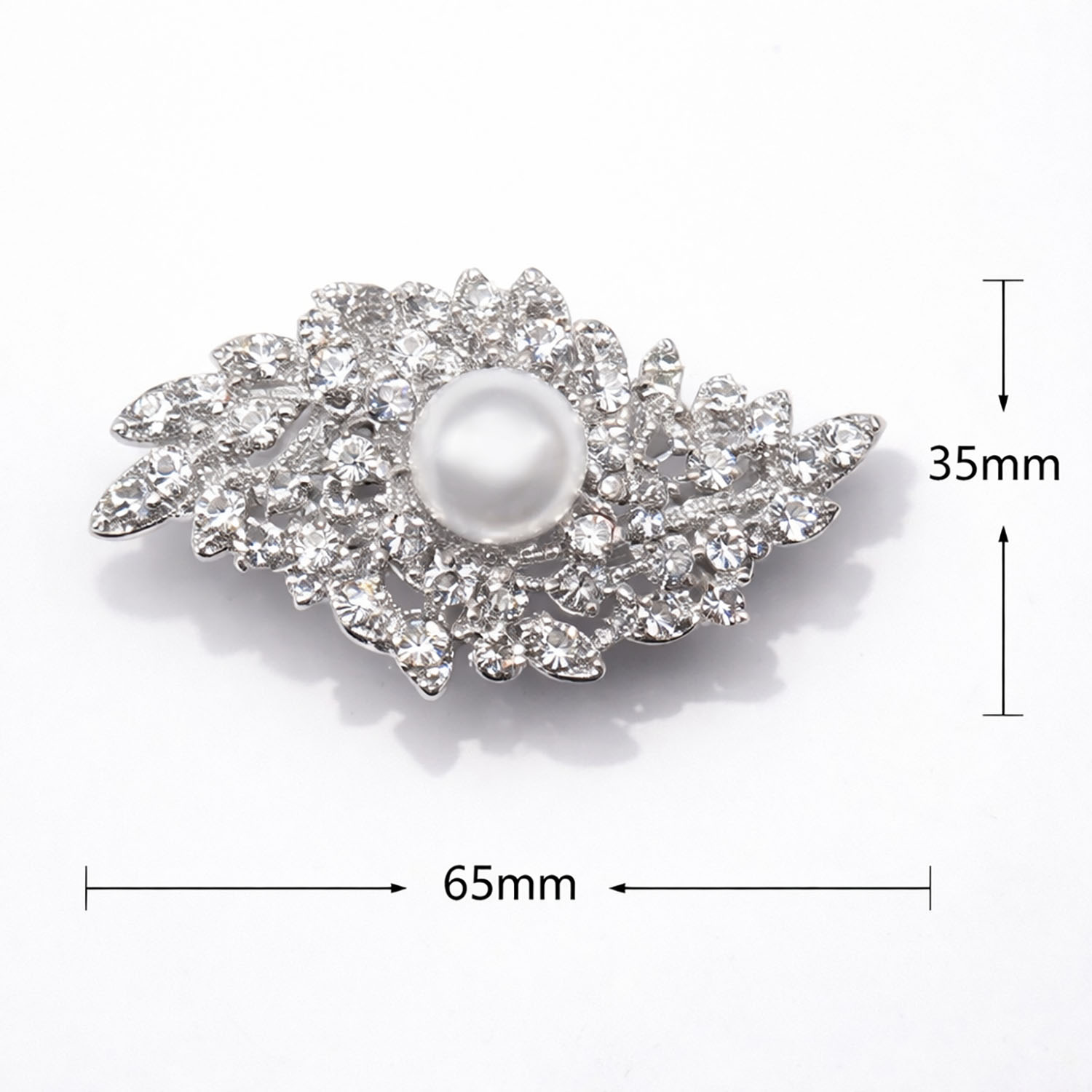Measurements of silver leaf brooch from Thailand