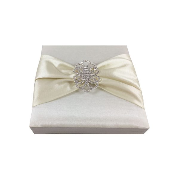 Brooch embellished white wedding invitation box