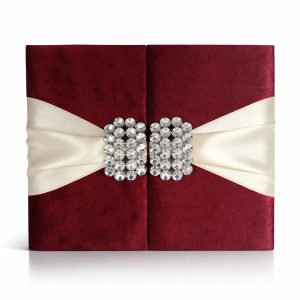 Luxury red velvet wedding invitation with pair brooch embellishment