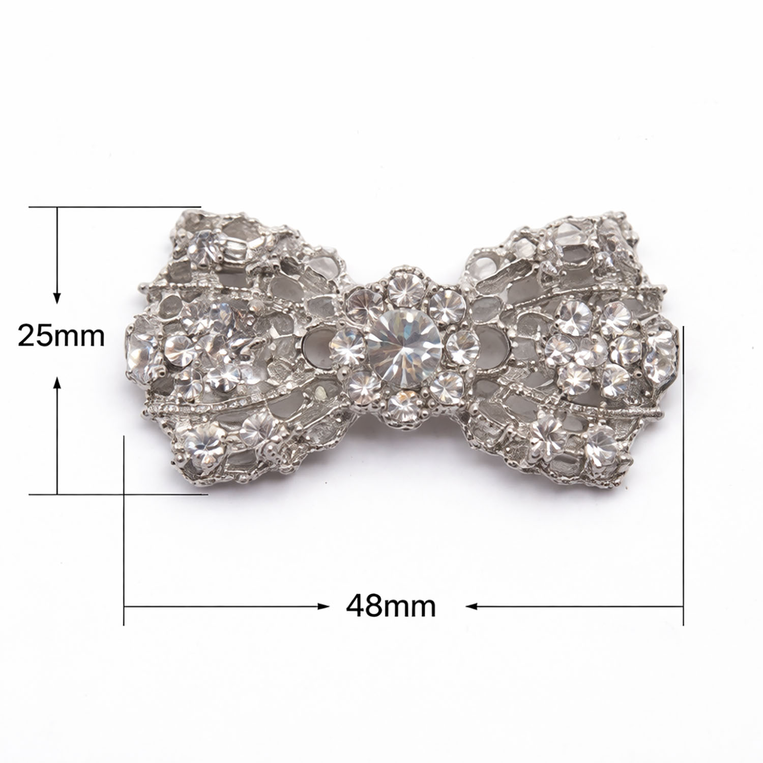 Silver bow rhinestone brooch