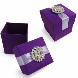 Purple silk wedding favor box with rhinestone brooch