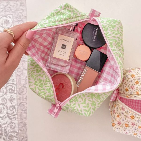 Quilted cotton cosmetic bag with zipper closure