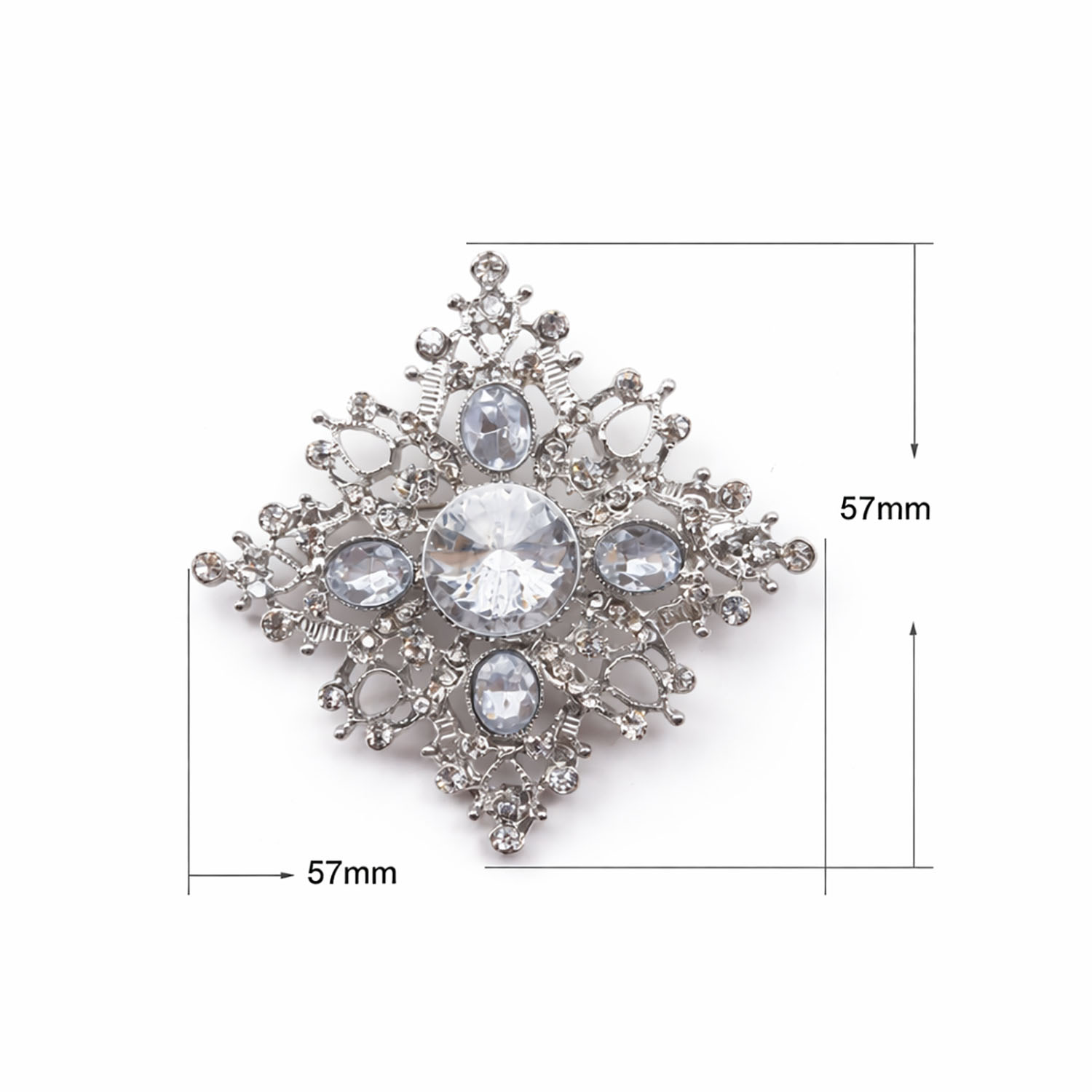Measurements of small rhinestone snowflake brooch from Thailand