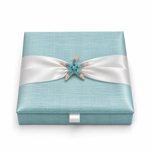 Aqua blue silk beach wedding invitation box with starfish brooch